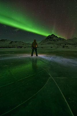 Angelcomb Mountain Dempster   Dawson 1 - Dylan Laird beneath Northern Lights and Angelcomb Mountain, tombstone territorial park, Yukon. Canada